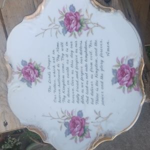 hanging ord's prayer plate and cross